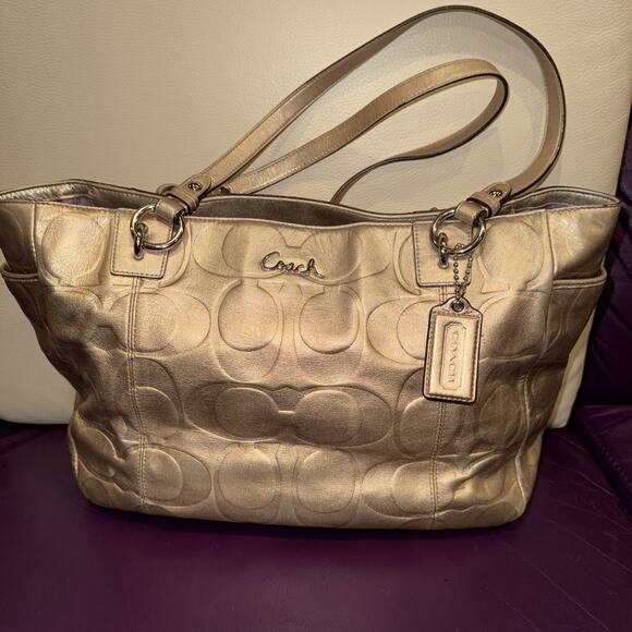 Coach Handbags - Coach East West Gallery tote bag in metallic gold embossed signature leather